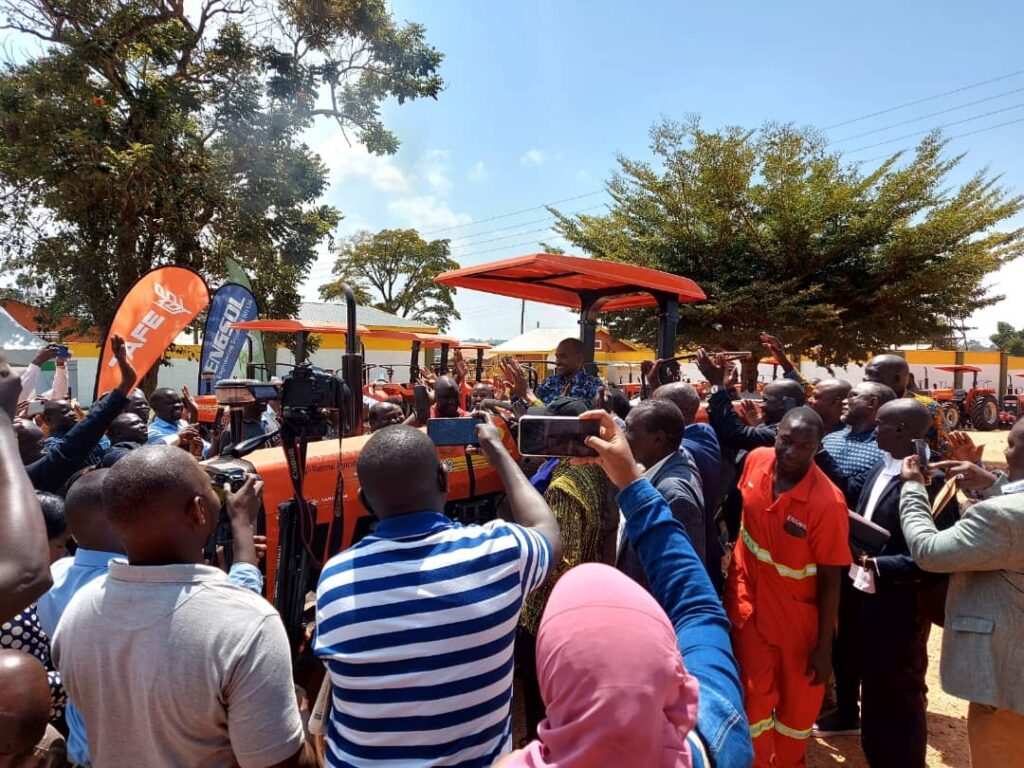 Hon. Frank Tumwebaze Hands over 25 Tractors to Farmer groups